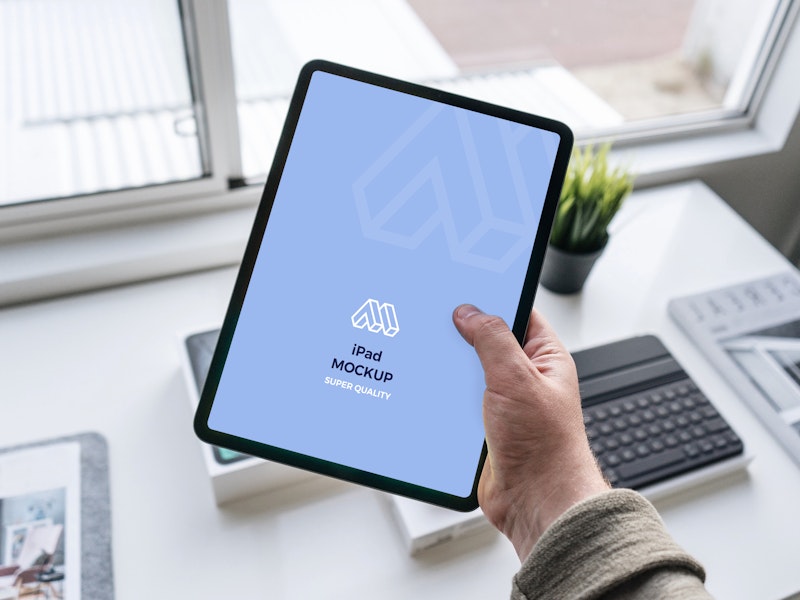 Tablet In Hand Mockup preview